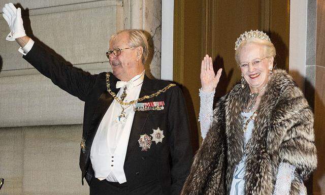 Henrik, Prince Consort of Denmark and Margrethe II of Denmark arrive at the New Year´s reception at the royal palace Amalienborg in Copenhagen