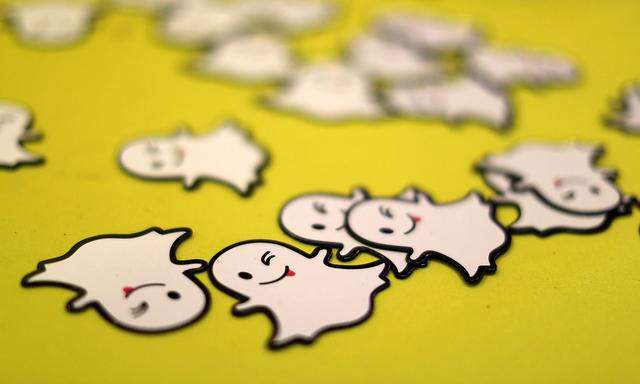 FILE PHOTO: The logo of messaging app Snapchat is seen at a booth at TechFair LA, a technology job fair, in Los Angeles
