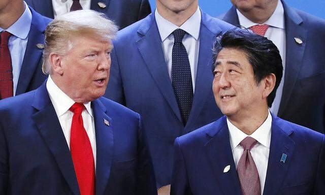 G 20 Summit in Buenos Aires U S President Donald Trump L and Japanese Prime Minister Shinzo Abe