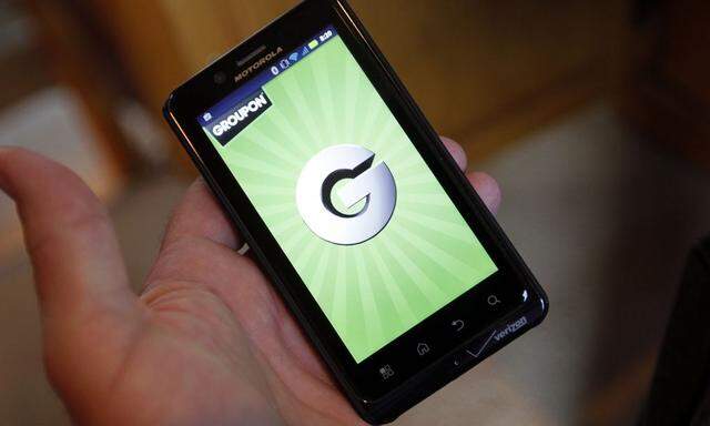 File of the Groupon smartphone app is displayed on a Motorola Droid Bionic cell phone in Denver