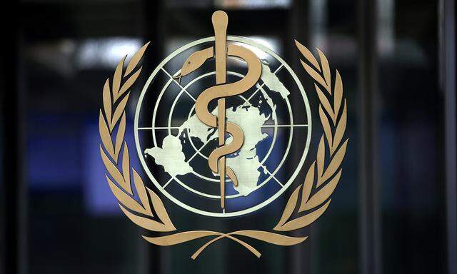 FILE PHOTO: FILE PHOTO: A logo is pictured on the headquarters of the WHO in Geneva