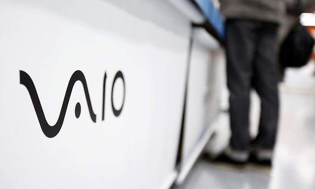 A logo of Sony Corp's Vaio is seen as a shopper looks at products at an electronics retail store in Tokyo