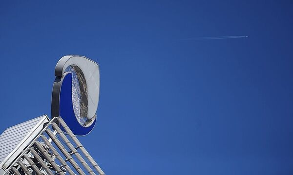 The logo of defunct lender Austrian bank Hypo Alpe Adria stands on the rooftop of its headquarters in Klagenfurt