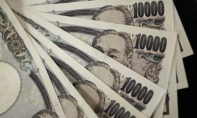 A picture illustration shows Japanese 10,000 yen notes featuring a portrait of Yukichi Fukuzawa, the 