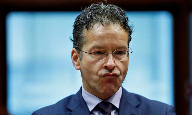 Dutch Finance Minister and Eurogroup President Jeroen Dijsselbloem reacts during a European Union finance ministers meeting in Brussels