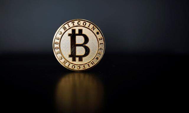 A Bitcoin (virtual currency) coin is seen in an illustration picture taken at La Maison du Bitcoin in Paris