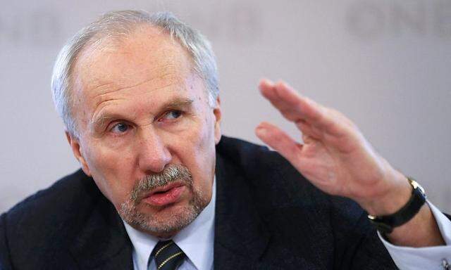 Austrian National Bank governor Nowotny addresses a news conference in Vienna