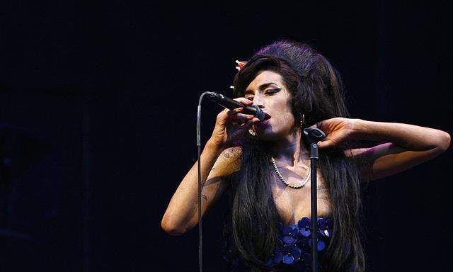 British singer Amy Winehouse performs at the Glastonbury Festival 2008 in Somerset in south west England