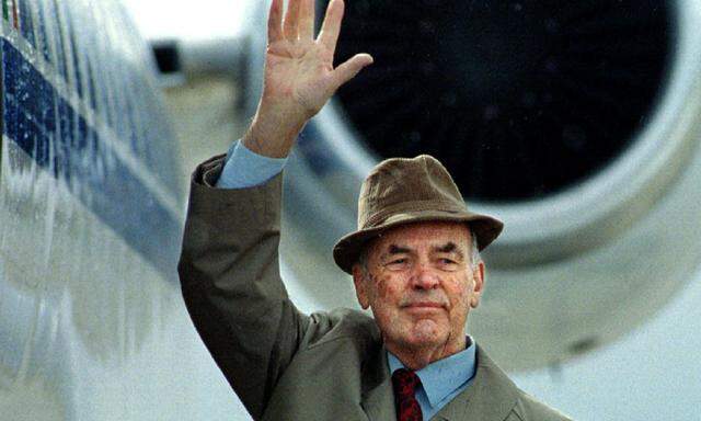 File photo of former German Nazi SS officer Erich Priebke waving to the members of the media as he boards a plane to be extradited to Italy to face a war crimes trial, in Bariloche, southern Argentina