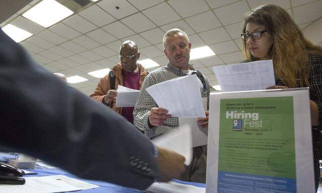 People seek employment at job fair for homeless at Los Angeles Mission in Skid Row area of Los Angeles, California