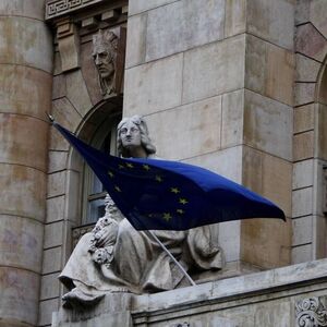 The flag of the European Union flies on the building of the National Bank of Hungary in Budapest