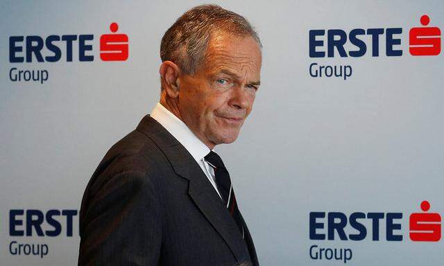 Erste Group Bank CEO Treichl arrives for a news conference in Vienna