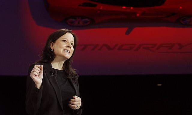 Mary Barra, Senior VP of General Motors Global Product Development, speaks near a 2014 Corvette Stingray at the North American International Auto Show in Detroit in this file photo