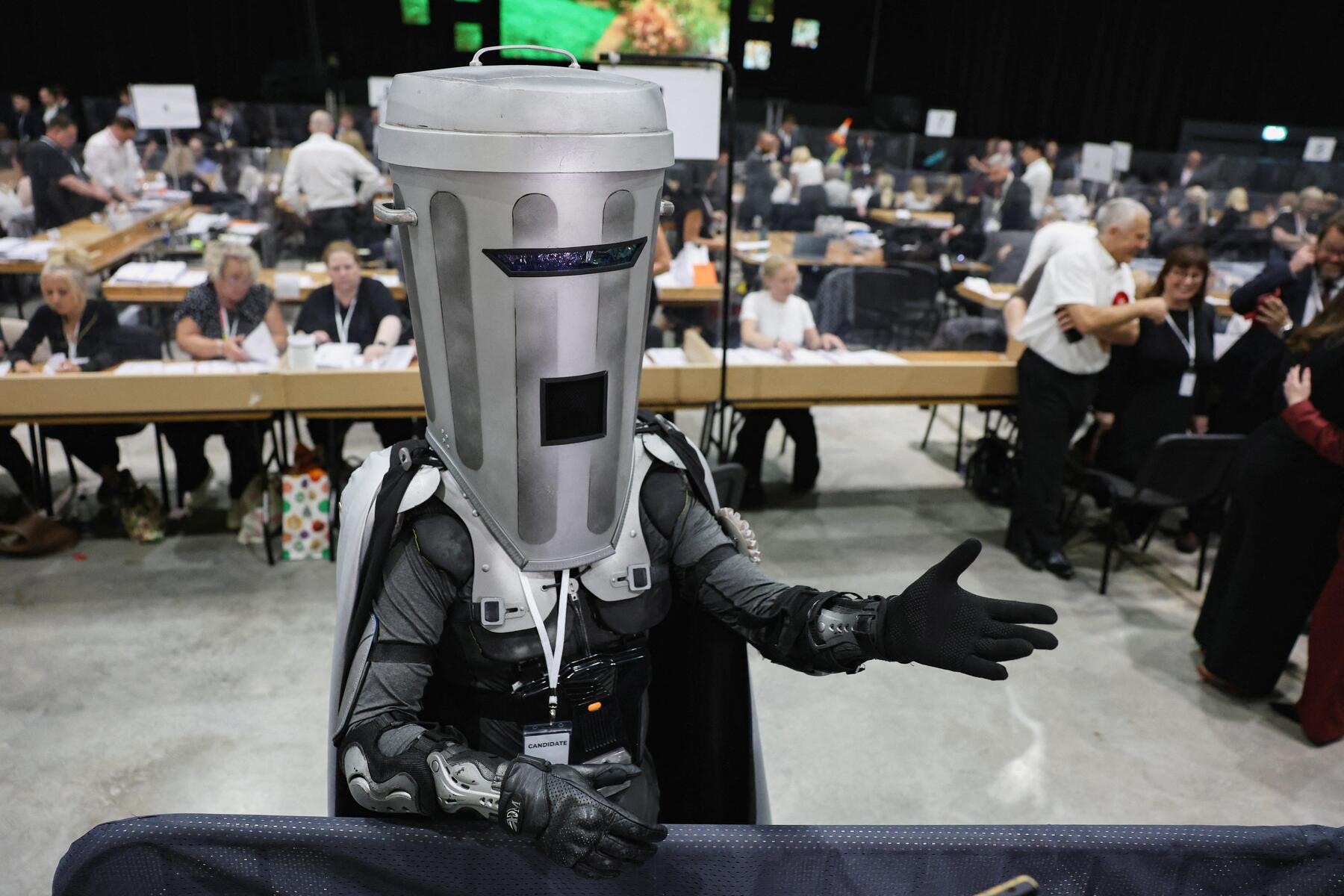 Who is this 'Count Binface' disrupting Nigel Farage's maneuvers?