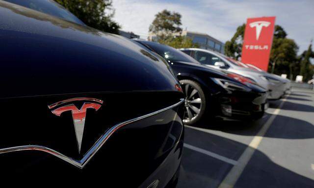 FILE PHOTO: A Tesla Model X is photographed alongside a Model S at a Tesla electric car dealership in Sydney