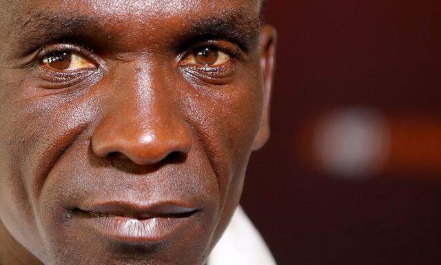 Eliud Kipchoge, the marathon world record holder from Kenya, poses ahead of a news conference in Vienna