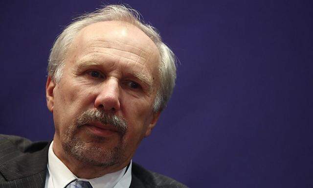 European Central Bank Governing Council member Nowotny listens to questions at a retail investor conference in Vienna