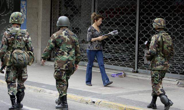 Chile Pluenderungen eskalieren Militaer