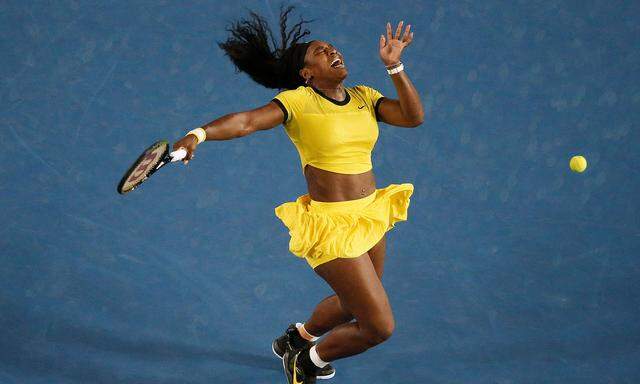 FILE PHOTO: Williams of the U.S. reacts after being hit by a ball during her final match against Germany's Kerber at the Australian Open tennis tournament at Melbourne Park