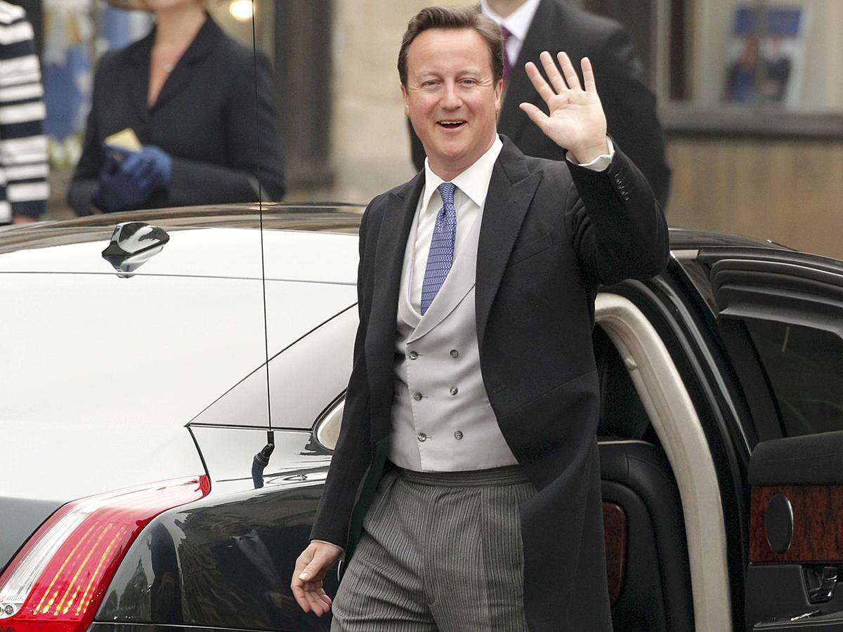Premierminister David Cameron erscheint sichtlich erfreut.