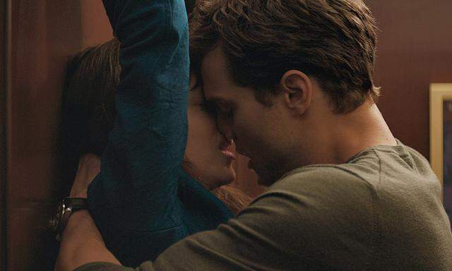 Dakota Johnson als Anastasia Steele, Jamie Dornan als Christian Grey 