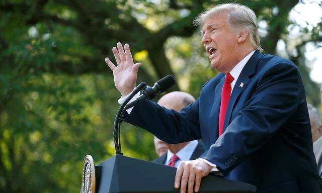 President Trump responds to a question about Supreme Court nominee Brett Kavanaugh at the White House in Washington