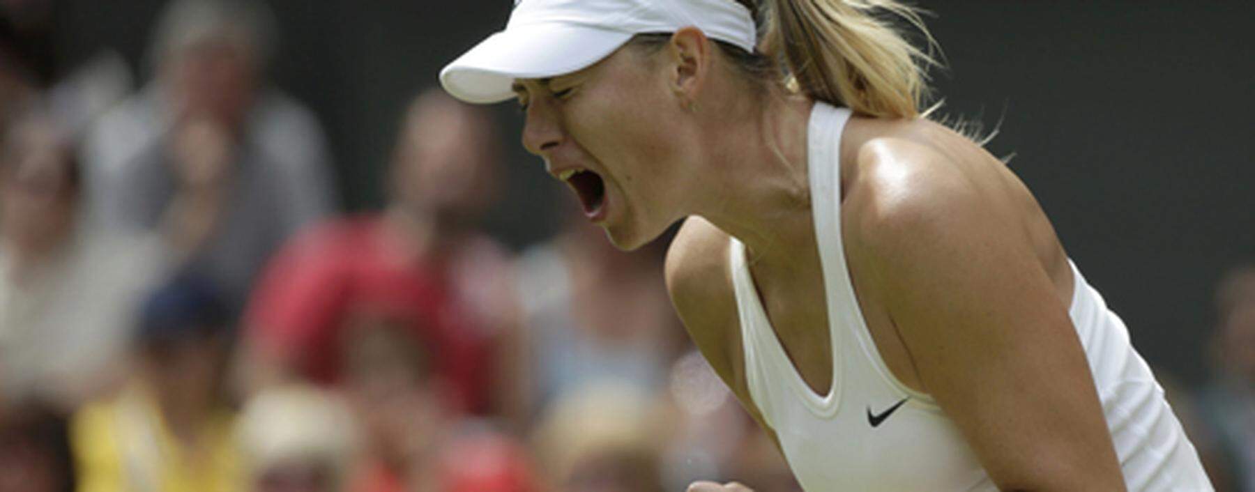 Maria Sharapova of Russia reacts during her women´s singles tennis match against Angelique Kerber of Germany at the Wimbledon Tennis Championships, in London