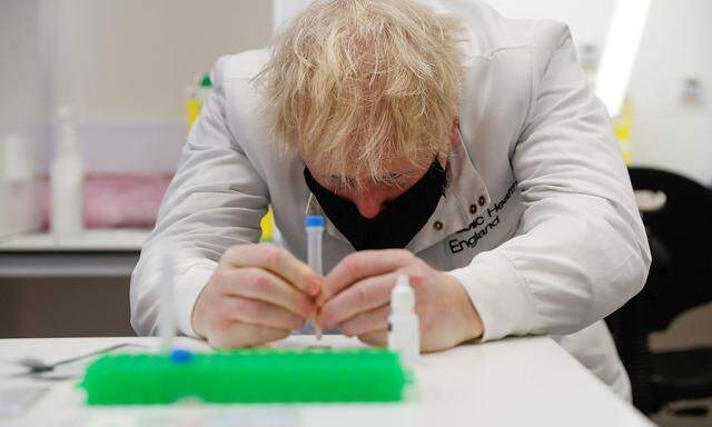 Britain's Prime Minister Boris Johnson visits the Porton Down science park, near Salisbury