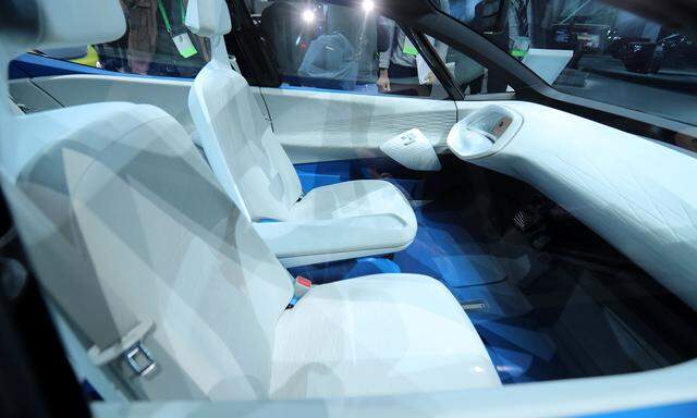 The interior of an autonomous Volkswagen I.D. concept vehicle is shown at the Los Angeles Auto Show