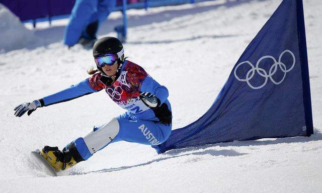 Austria's Dujmovits competes during the women's parallel snowboard finals at the 2014 Sochi Winter Olympic Games in Rosa Khutor