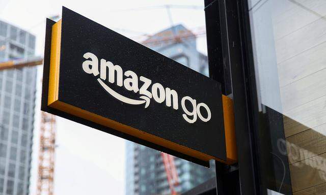 FILE PHOTO: A sign for the new Amazon Go store on 7th Avenue at Amazon's Seattle headquarters in Seattle