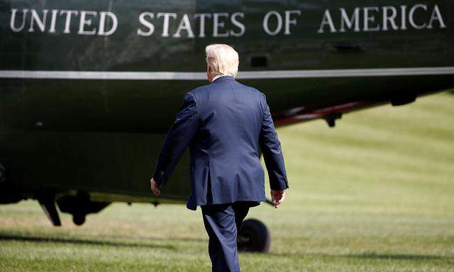 U.S. President Donald Trump walks to Marine One as he departs for a day trip to West Virginia from the White House in Washington