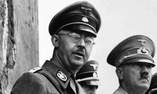 Heinrich Himmler, neben Adolf Hitler.