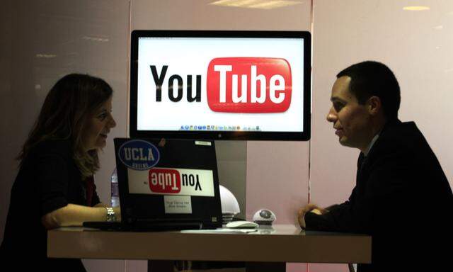 File photo of visitors at ´You Tube´ stand during the MIDEM in Cannes