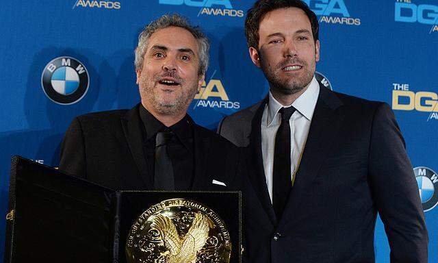 Director Alfonso Cuaron appears backstage with his award after the Directors Guild of America bestow