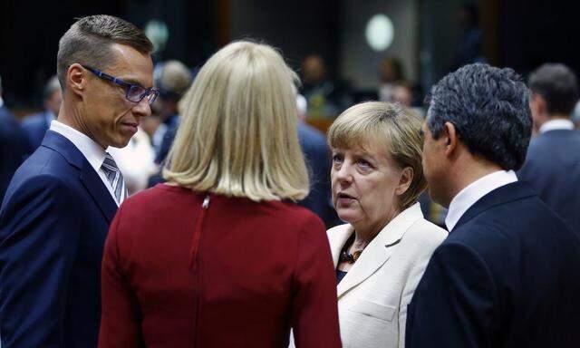 European leaders hold a discussion at the start of a European Union summit in Brussels