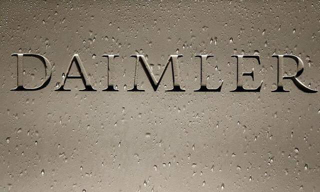 Daimler AG sign with raindrops is pictured before company's annual news conference in Stuttgart
