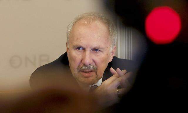 European Central Bank Governing Council member Nowotny addresses a news conference in Vienna