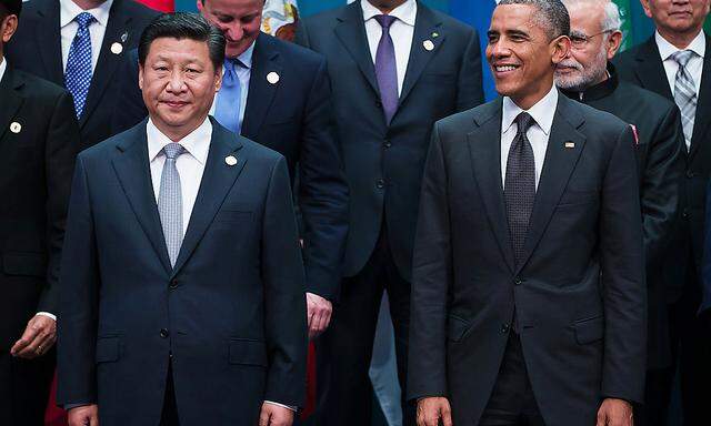 Archivbild vom G20-Treffen in Brisbane mit Chinas Präsident Xi Jinping und US-Präsident Barack Obama.