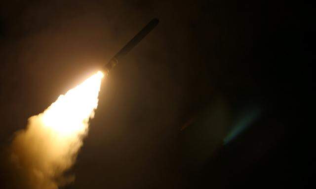 The guided-missile destroyer USS Laboon fires a Tomahawk land attack missile