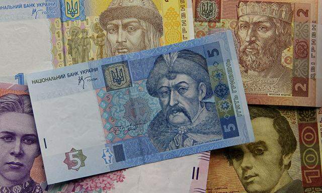 Banknotes of Ukrainian hryvnia are seen Kiev