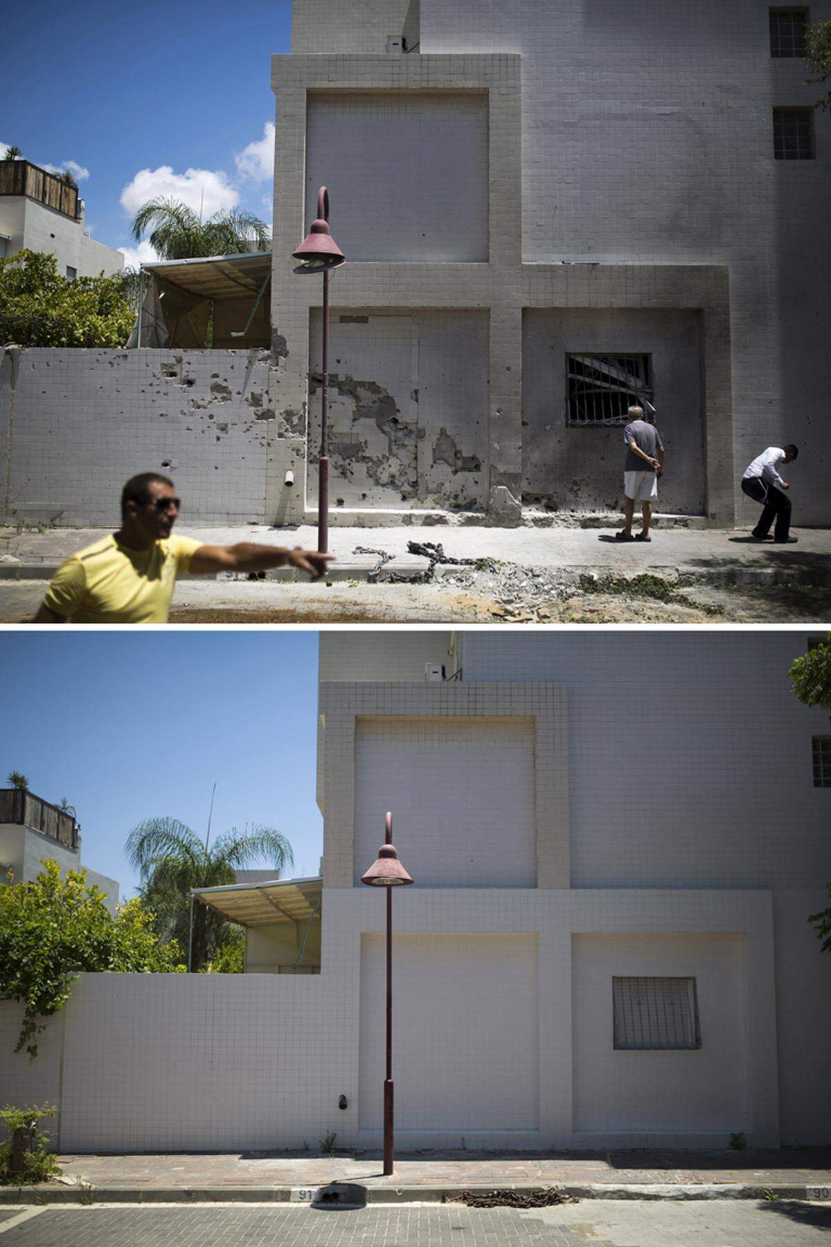 Die Raketenspuren in Ashdod in Israel sind ein Jahr nach dem Krieg beseitigt, zu mindest auf dieser Häuserwand. Die Sorge vor einem erneuten Konflikt ist groß. Israel vermutet zwei Staatsbürger als Geiseln im Gazastreifen.
