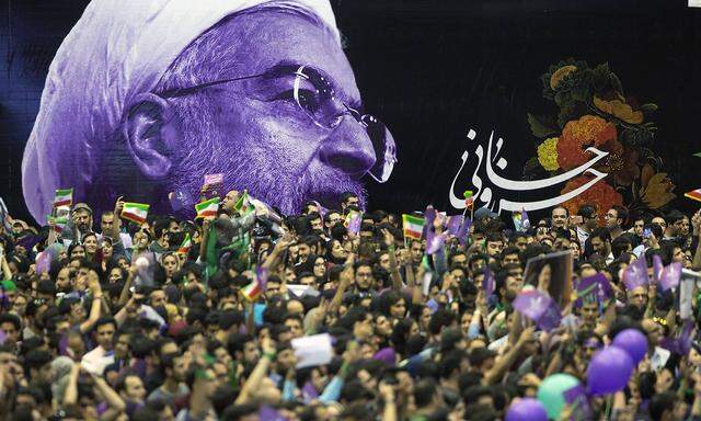 Hassan Rohanis Anhänger können jubeln, ihr Kandidat setzte sich bei den iranischen Präsidentschaftswahlen durch.