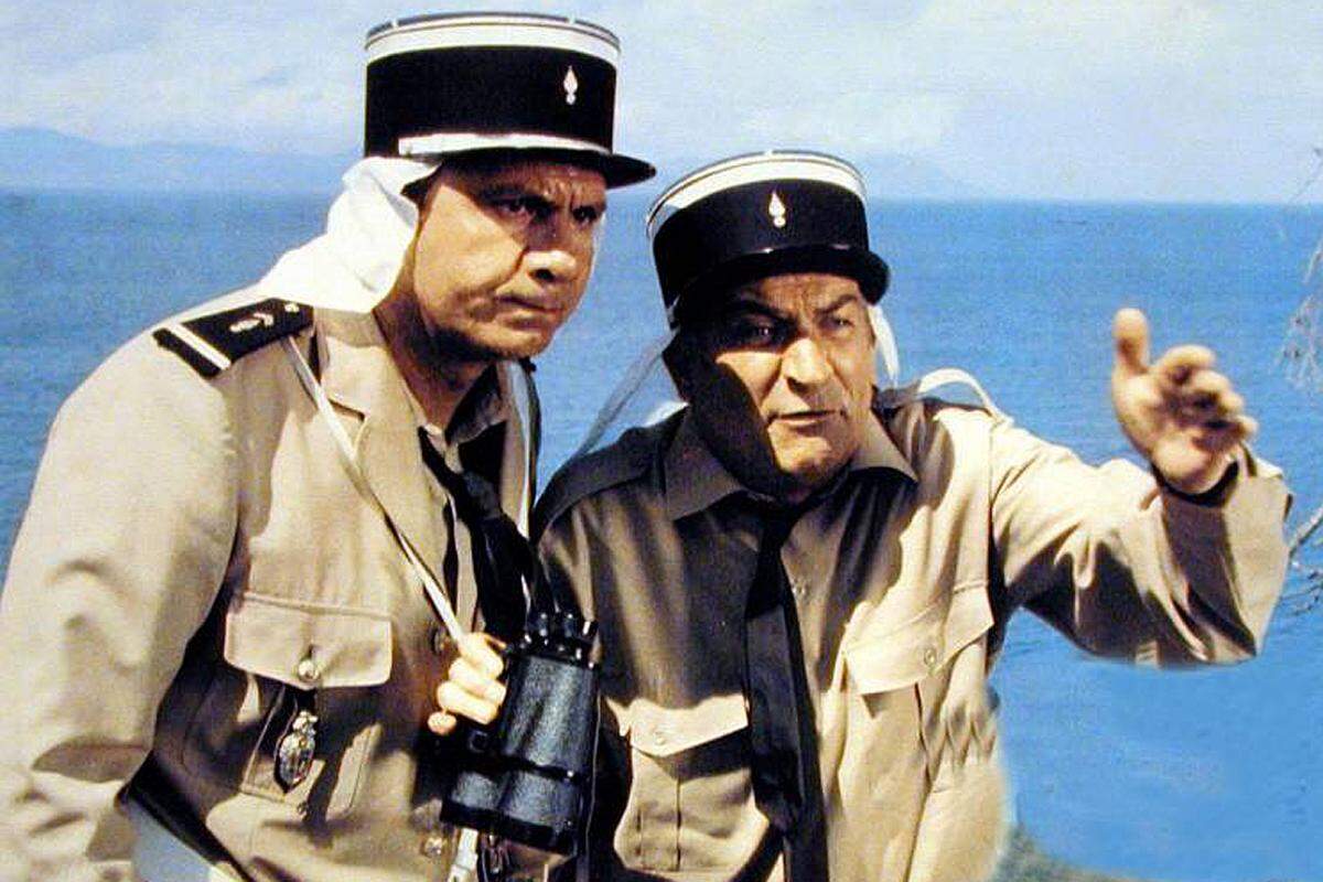 Im selben Jahr kam "Der Gendarm von Saint Tropez" in die französischen Kinos. Die Komödie war wie auf den kleinen Komiker zugeschnitten.Im Bild: Mit Michel Galabru, der seinen Kollegen/Rivalen Jérome Gerber spielte.