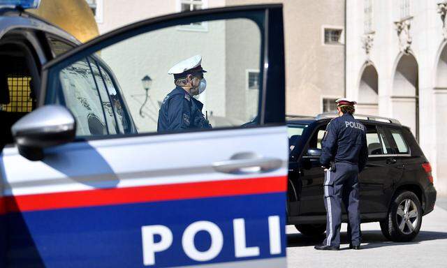 SALZBURG: CORONAVIRUS - POLIZEI MIT MUNDSCHUTZ