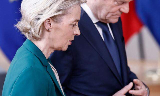 European Commission President Ursula von der Leyen and Poland‘s Prime Minister Donald Tusk arrive to attend a European Council summit during the second and last day at the EU headquarters, in Brussels, on March 22, 2024. (Photo by Sameer Al-Doumy/AFP)