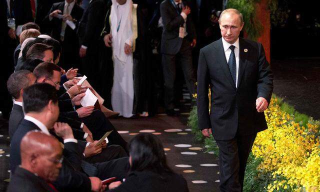 Russia´s President Vladimir Putin arrives at the ´Welcome to Country´ ceremony at the G20 summit in Brisbane