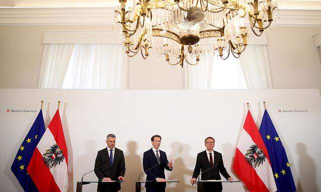 Austrian Chancellor Sebastian Kurz, Health Minister Rudolf Anschober and Interior Minister Karl Nehammer attend a news conference in Vienna