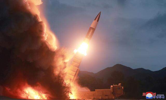 KCNA picture of North Korea test firing a new weapon