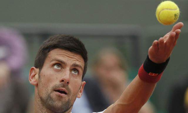 Tennis - French Open - Roland Garros - Novak Djokovic of Serbia vs Steve Darcis of Belgium